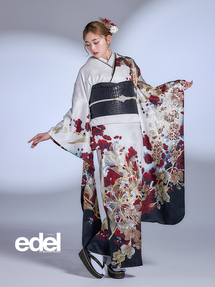 edel ゆうちゃみさん着用の、凛とした白黒に赤が映える上品モダンな振袖。